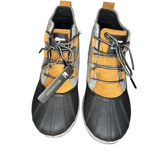 Sorel women’s Black and Tan Waterproof boots, “out and about”.